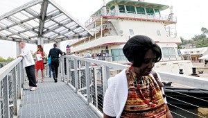 Ruby Green walks on the platform bridge outside the museum during the grand opening of the Lower Mississippi Museum and Riverfront Interpretive Site Friday.  (File  / Vicksburg Post )