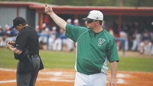 Vicksburg High baseball coach Ryan Grey signals for a pitching change during a game against Warren Central this season. Grey is leaving VHS after three seasons as its head coach. (Ernest Bowker/The Vicksburg Post)