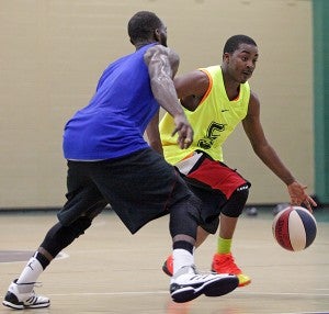 Dominique Brown heads downcourt during a scrimmage Friday in an ABA summer league game at Jackson Street Community Center.