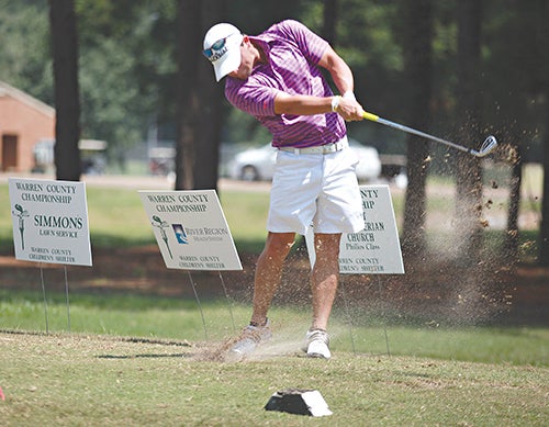Three-time defending champion Chris Whittington tees off on the 13th hole Saturday during the Warren County Championship. Whittington was in second place, one shot behind leader Nick Mekus, heading into today's final round. (Ernest Bowker/The Vicksburg Post)