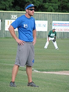 Chris Mixon coaches third base during a Porters Chapel Academy summer baseball game in 2013. Mixon has taken an assistant coaching position at Central Hinds Academy.