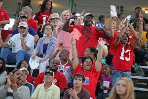 Warren Central fans leap to their feet Friday while WC and Terry face off in the second game of the day during the annual Red Carpet Bowl at Memorial Stadium. (Justin Sellers/The Vicksburg Post)