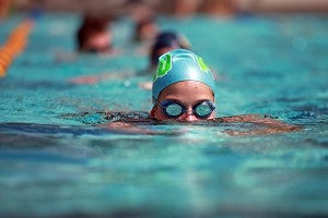 Clinton resident Addison Bridges, 14, practices Saturday along with dozens of other young swimmers participating in a clinic by Olympic gold medal swimmer Jason Lezak at Vicksburg City Pool as a part of Mississippi Swimming's state convention being held in Vicksburg. (Justin Sellers/The Vicksburg Post)