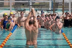 Dozens of young swimmers listen attentively as Olympic gold medal swimmer Jason Lezak gives leads a clinic Saturday at Vicksburg City Pool as a part of Mississippi Swimming's state convention being held in Vicksburg. (Justin Sellers/The Vicksburg Post)