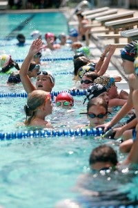 Dozens of young swimmers participate in a clinic led by Olympic gold medal swimmer Jason Lezak Saturday at Vicksburg City Pool as a part of Mississippi Swimming's state convention being held in Vicksburg. (Justin Sellers/The Vicksburg Post)