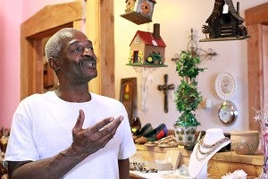 Convicted felon James Allen, 59, talks inside the Arthur Street thrift store. (Justin Sellers / The Vicksburg Post)