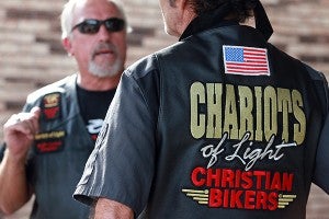 The Rev. Doyle Moulder, left, and Pete Toten, charter members of the South Central Chapter of Chariots of Light Christian bikers club, talk Friday in front of Living Water Christian Fellowship. Living Water will be hosting a biker weekend Oct. 4 and 5 with Dr. Jerry Savelle. (Justin Sellers/The Vicksburg Post)