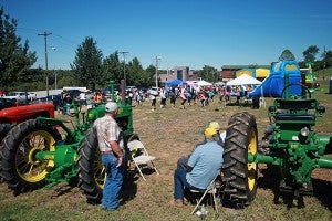 Visitors to the Vicksburg Fall Festival enjoy the festivities Saturday morning. (Justin Sellers/The Vicksburg Post)