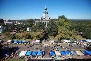 Visitors walk down Cherry Street Saturday morning during the Old Court House Flea Market. (Justin Sellers/The Vicksburg Post)