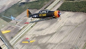 Three T-6 airplanes fly over the Mississippi Delta Friday afternoon. (Paul Barry•The Vicksburg Post)