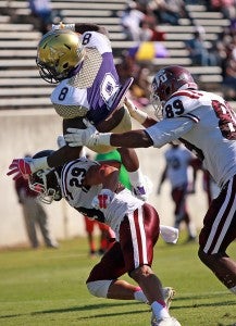 Alcorn State junior wide receiver Jarvis Turner leaps for the goal line over Texas Southern's Le Tevin Wilcox (29) and Justin Wheat (89) and comes up just short Saturday afternoon at Jack Spinks-Marino Casem Stadium. (Justin Sellers/The Vicksburg Post)