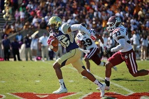 Alcorn State sophomore wide receiver Norlando Veals carries the ball downfield after a catch past Texas Southern junior linebacker Jarius Moore Saturday afternoon at Jack Spinks-Marino Casem Stadium. (Justin Sellers/The Vicksburg Post)