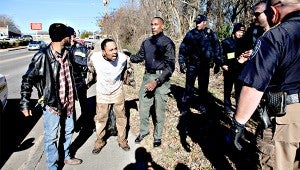 Darryl Williams, above,  is taken into custody by Vicksburg police officers in January after fleeing on foot into a heavily wooded area off Mission 66 between Clay Street and Baldwin Ferry Road.