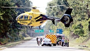 A man is airlifted, above, to University of Mississippi Medical Center in October after a one-vehicle motorcycle wreck in which the passenger was killed.  