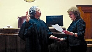 Ninth Circuit Chancellor Vicki Roach Barnes, left, is sworn in by Chancery Clerk Donna Hardy.