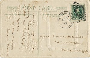 The Christmas card is postmarked Dec. 24, 1913.