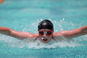 Vicksburg Swim Association's Leah Larson swims Friday during the Stamm Family Invitational at City Pool. (Justin Sellers/The Vicksburg Post)