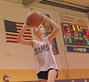 Kendyl Rice shoots a layup during a drill at the Delvin Thompson Basketball School summer camp Monday at St. Aloysius. The camp is for boys and girls in grades 1-8 and continues through Friday. (Ernest Bowker/The Vicksburg Post)