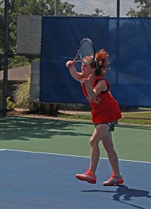 Allie Falls follows through on a shot while working on a drill at the City of Vicksburg’s summer tennis camp at Halls Ferry Park. (Ernest Bowker/The Vicksburg Post)