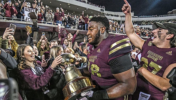 Gee whiz: Peeing dog celebration costs Ole Miss in Egg Bowl - The