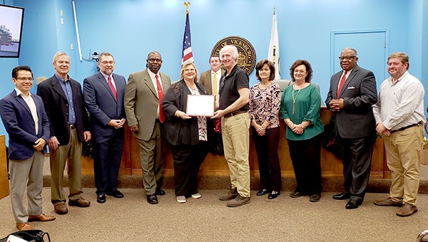 City honored for partnership that paved Mississippi Hardware parking ...