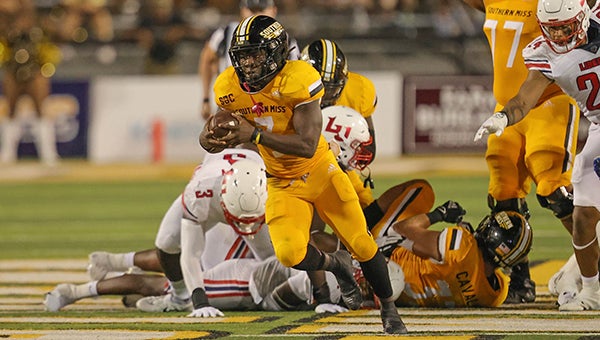 November 26, 2022: Southern Miss running back Frank Gore Jr. (3) tries to  outrun ULM s