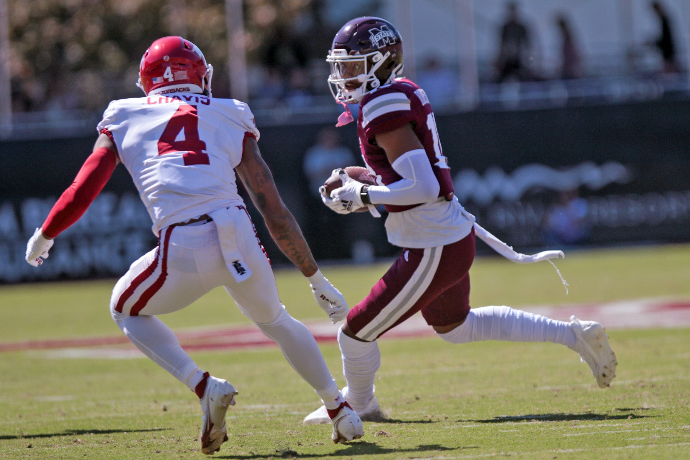 Arkansas defensive lineman McTelvin Agim gets ready to run a play against  Mississippi State during an NCAA college football game, Saturday, Nov. 2,  2019 in Fayetteville, Ark. (AP Photo/Michael Woods Stock Photo 