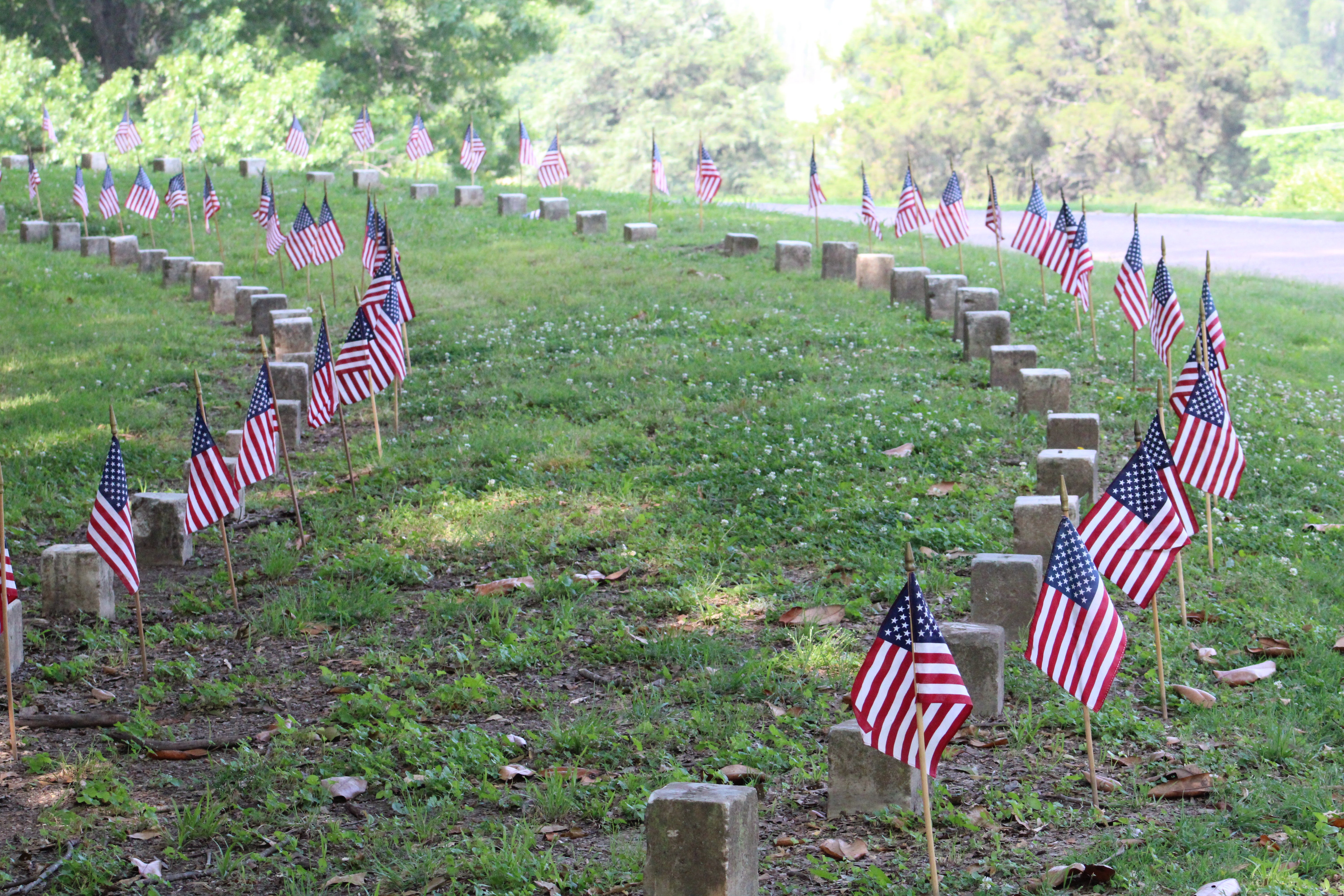 MEMORIAL DAY: Volunteers place American flags at Vicksburg National ...